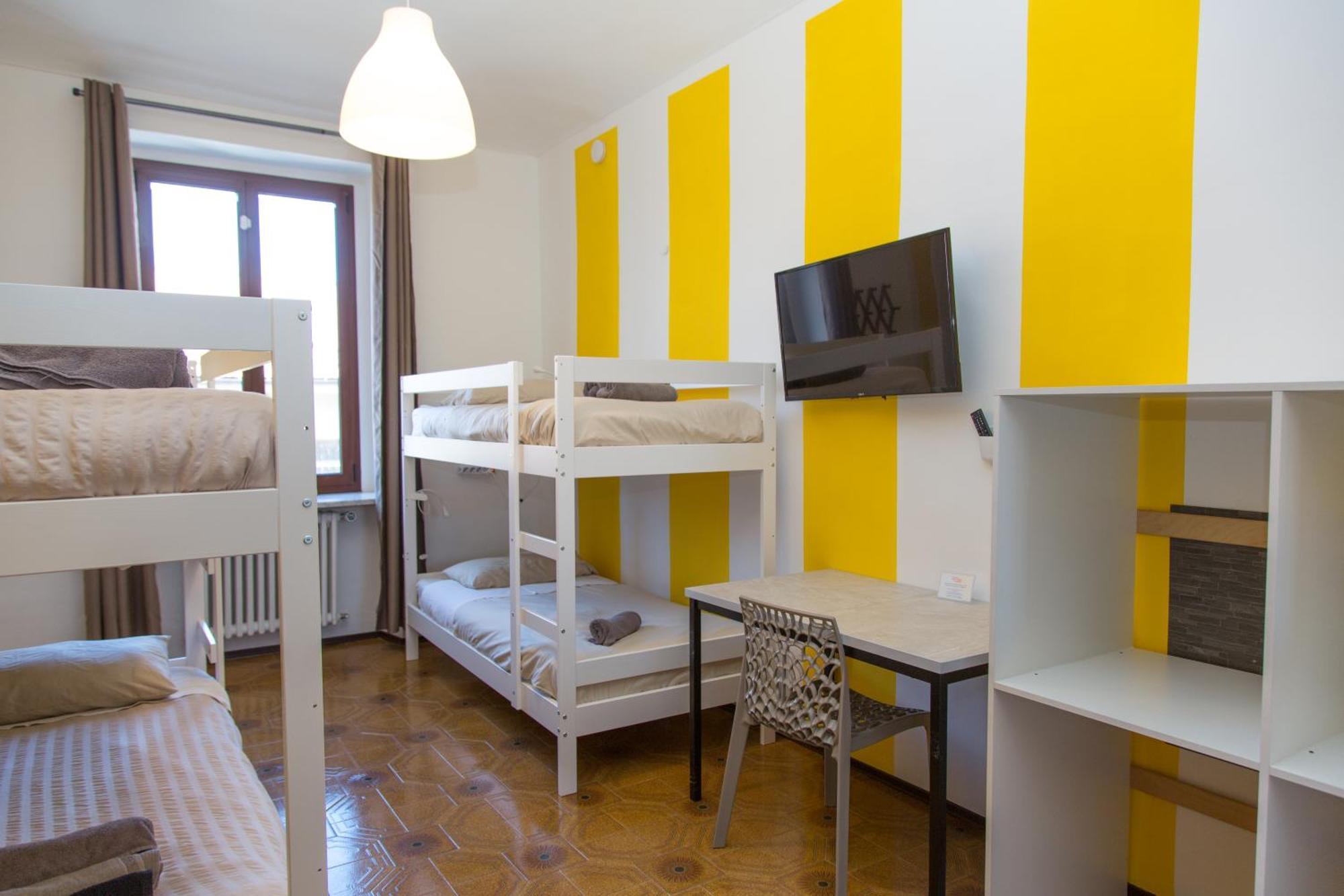 Chambre Quadruple avec Salle de Bains Commune